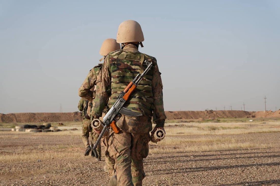 صور: قوات خاصة من الحشد الشعبي تجري تمريناً بالذخيرة الحية
