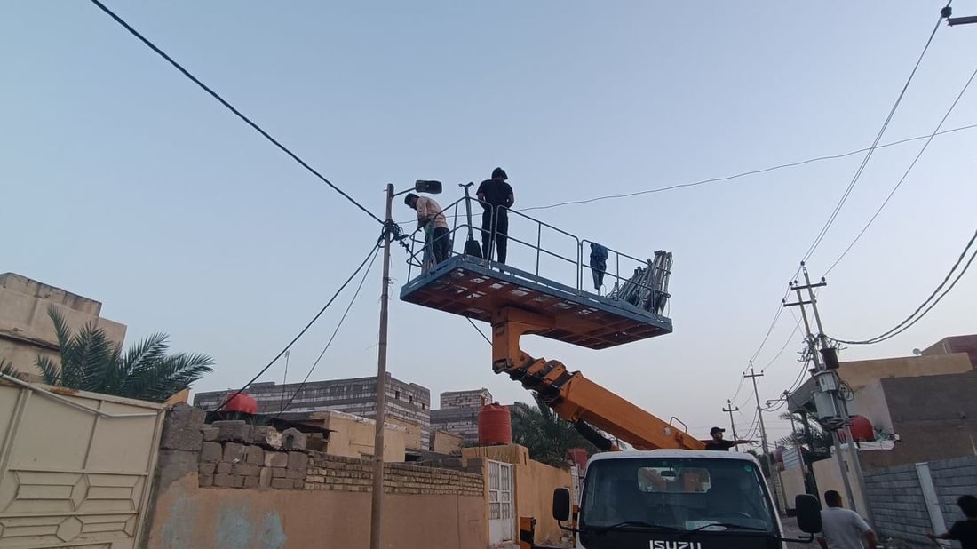Streetlight installation brightens Al-Faw district
