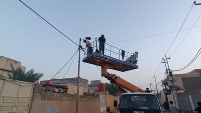 Streetlight installation brightens Al-Faw district