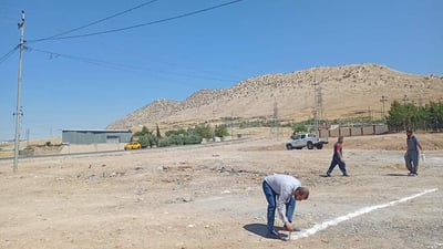 کارگەیەک دەیەوێت باخچەیەک بۆ تەکیەی کاکەمەند دروست بکات