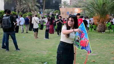 Kites stay grounded, but spirits soar at Abu Nuwas Park festival
