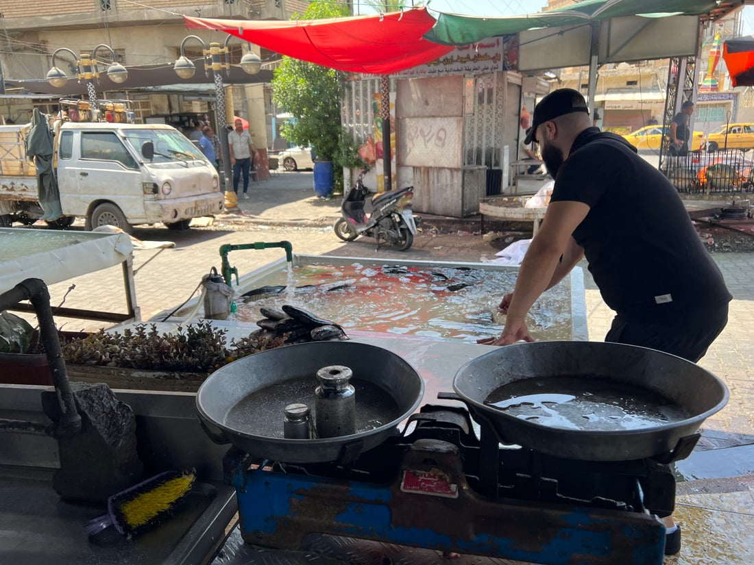 صور من “بورصة” الشواكة: أسماك بحر البصرة غائبة.. العمارة تسيطر على سوق بغداد