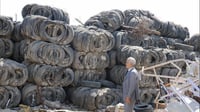 Erbil cracks down on tire burning for scrap metal