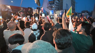 Crowds gather in Baghdad to celebrate ceasefire, hailing it as Iranian ‘victory’