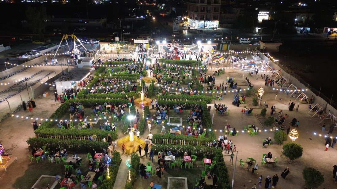 صور: العيد ليلاً في المحمودية.. لا نذهب إلى بغداد كثيراً فالمتنزهات “تتطور وتتطور”