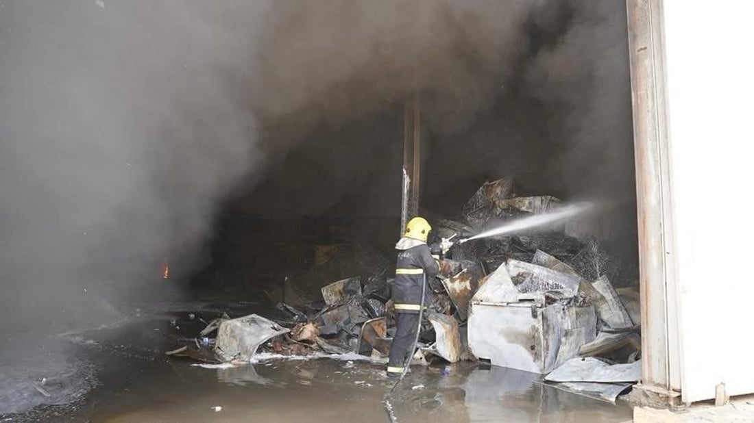Civil defense extinguishes large fire at electrical storage facility in Baghdad