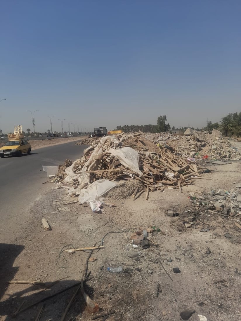 Police detain two for illegal dumping on Baghdad road