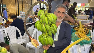 جوتیارێکی گەرمیان لە باخەکەی خۆی مۆزی بەرهەم هێناوە