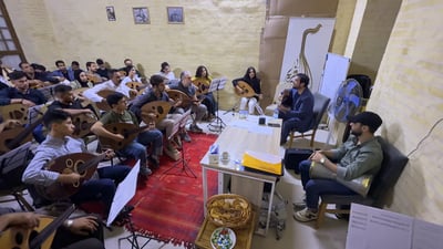 Workshop on Maqam music draws musicians to Baghdad’s Al-Mutanabbi Street