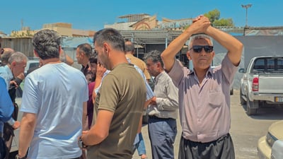 دوکاندارانى بازاڕى دارەسووتاوەکە چاوەڕێى چوارشەممەن