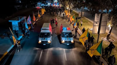صور: كتائب حزب الله تشيع اثنين من مقاتليها في بغداد