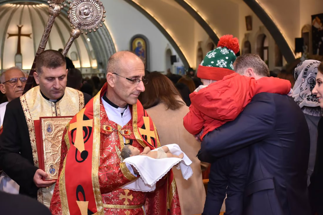 Photos: Somber Christmas Mass in Hamdaniya