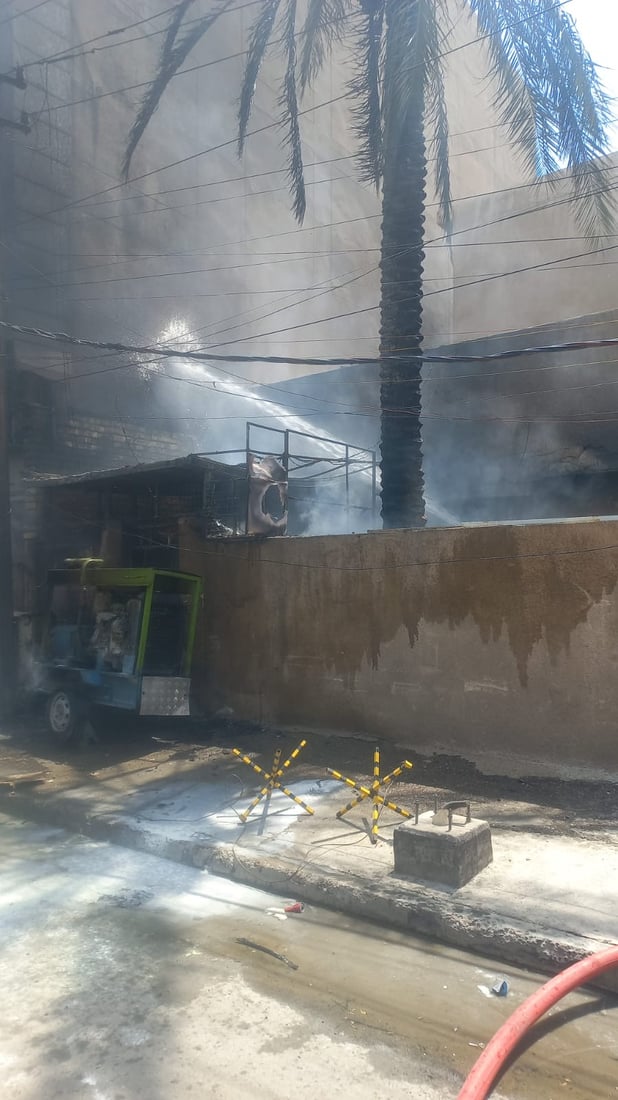 صور وفيديو: الدخان يغطي سماء الكرادة لكن تمت السيطرة على النيران