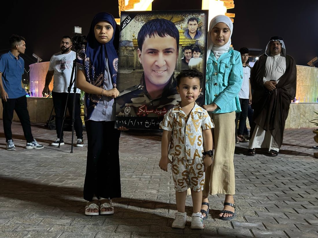 صور من الكوت: شموع وحزن حول نصب سبايكر في ذكرى المجزرة الأليمة