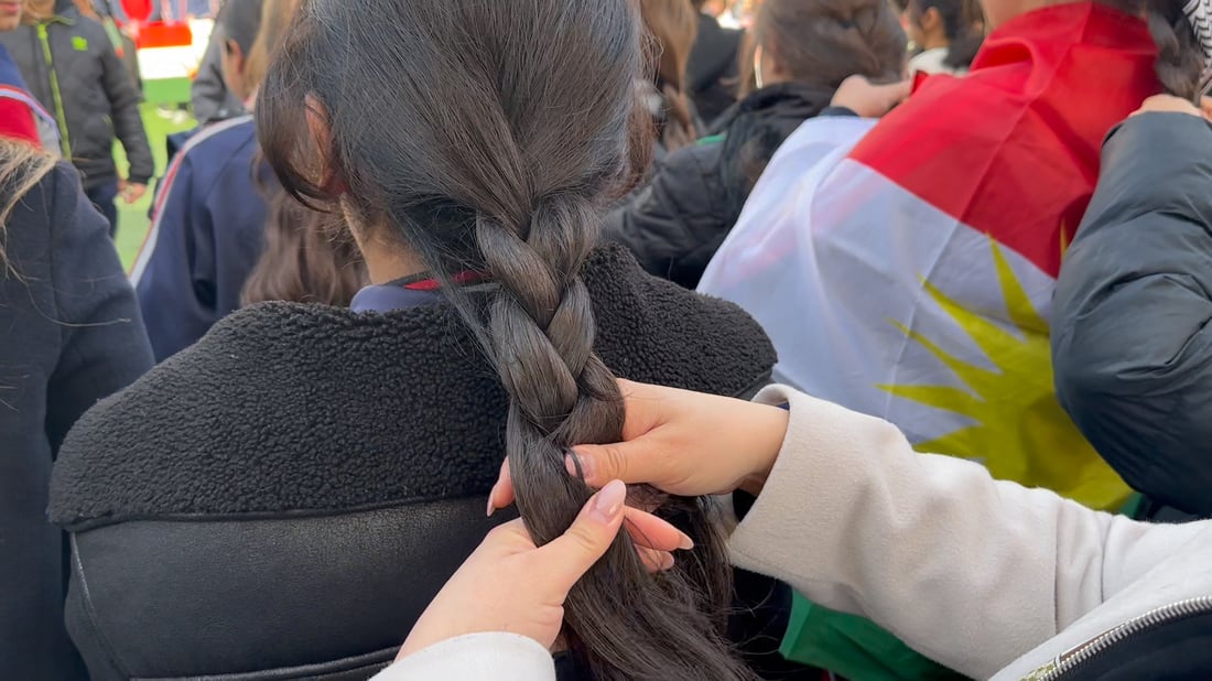 Outrage grows after Syrian regime militant shows off braids of killed Kurdish woman
