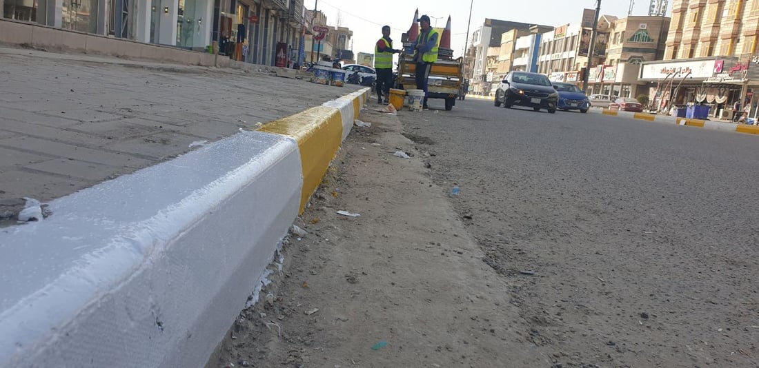 صور: أرصفة السماوة بالأبيض والاصفر.. باكورة أعمال التأهيل لشوارع المدينة