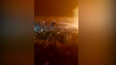 Civil defense teams battle wildfires in Najaf and Diyala