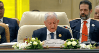 Iraqi president condemns displacement of Palestinians at Cairo summit, calls for Gaza reconstruction