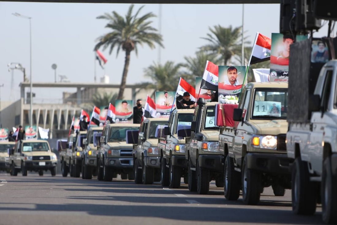 صور: الحشد يقيم تشييعاً رمزياً لضحاياه الذين سقطوا بقصف أميركي 2019