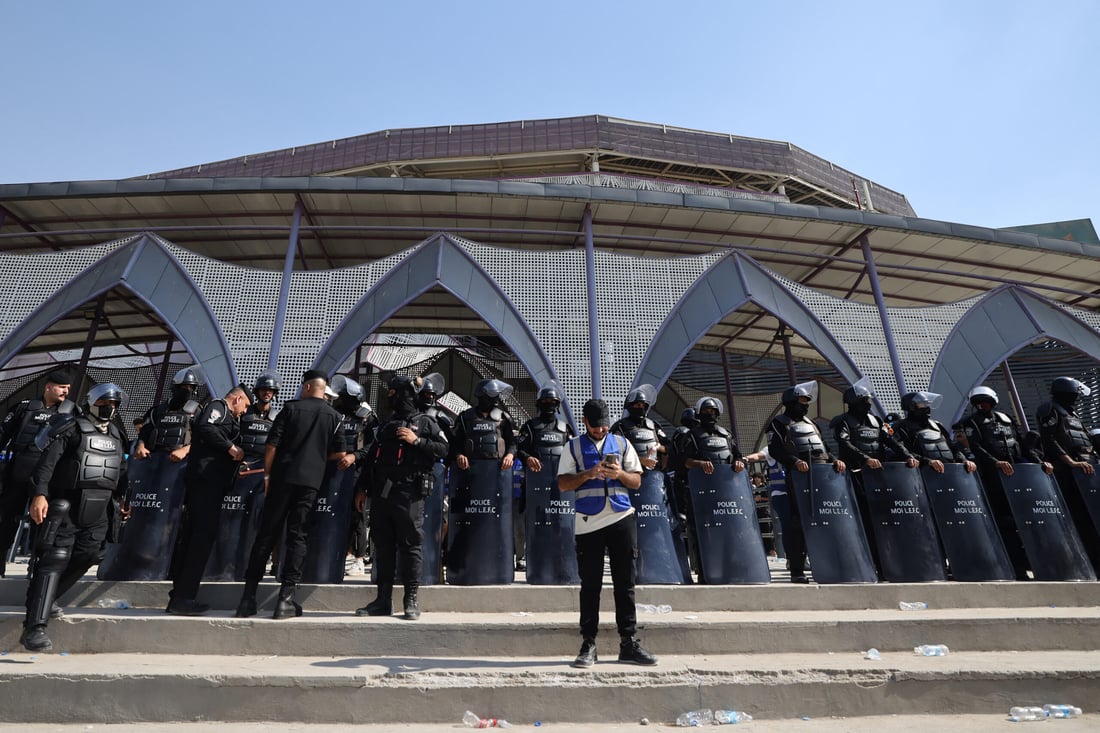 Iraqi security forces stand guard outside the stadium ahead of the AFC Champions League Elite West Region football match (Photo by AHMAD AL-RUBAYE / AFP)
