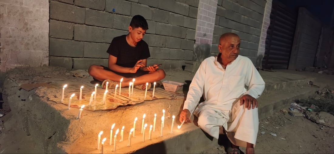 “ليلة الوحشة” في أبو الخصيب.. أضواء الشموع تستحضر غربة السيدة زينب