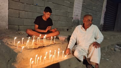 “ليلة الوحشة” في أبو الخصيب.. أضواء الشموع تستحضر غربة السيدة زينب