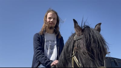 Swiss national riding along with locals
