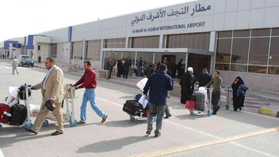النزاهة تضبط معاملات شراء صورية بنصف مليون دولار في مطار النجف
