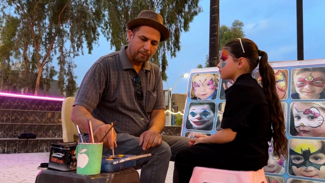 Baghdad artist brings face painting joy to children in Anbar’s city of Hit