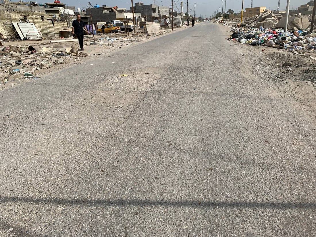 صور من هور رجب: شارع خط النفط مبلّط.. لكنه ضيق ومتخسف بسبب الشاحنات