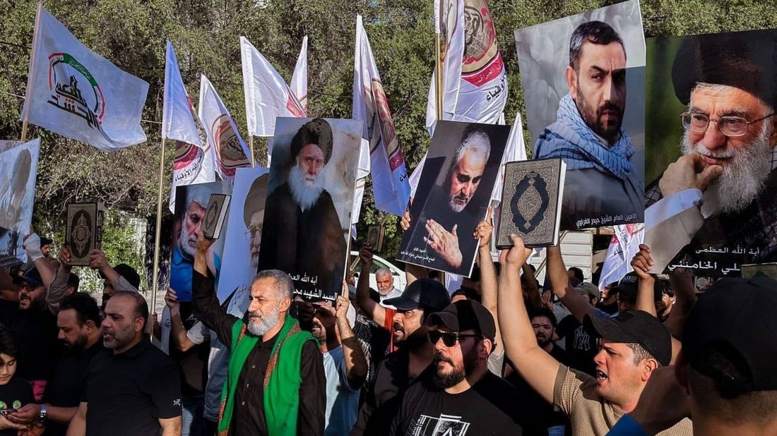 صور خامنئي والصدر تتقدم مسيرات الجادرية لنصرة القرآن