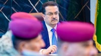 أميركا وإيران سيقصفان العراق بسبب الفصائل.. السوداني ص�...
