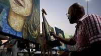 البصرة: فنان يرسم بالأصابع 