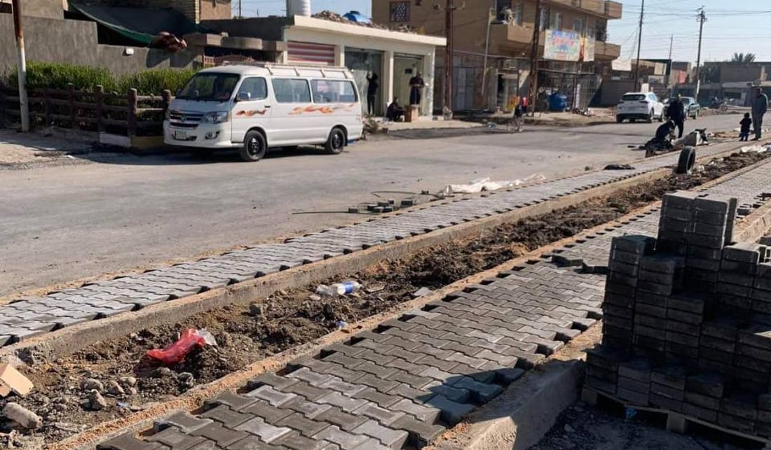 مقرنص وإنارة.. خدمات جديدة لـ “شارع الطرشي” في أبو غريب (صور)