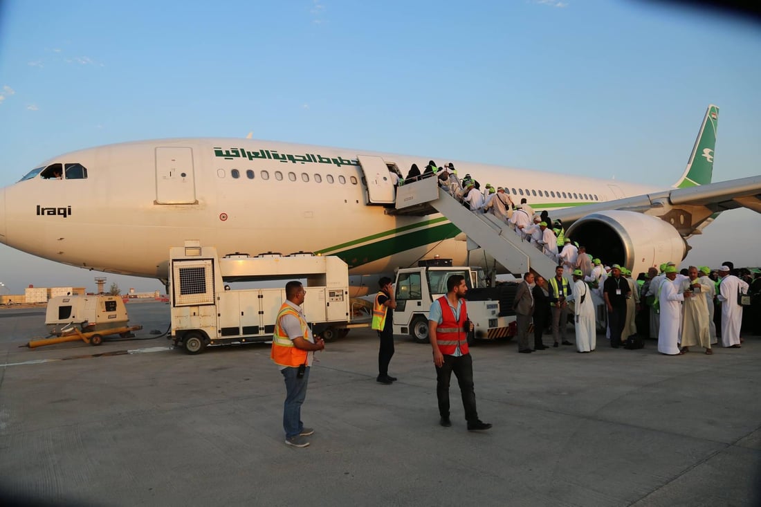 على متن الناقل الوطني.. تفويج أول وجبة من الحجاج عبر مطاري بغداد والنجف (صور)