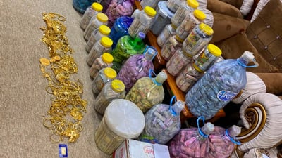 Investigators find another $19 million hidden in walls and water jugs