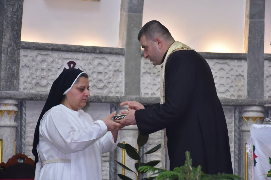 Photos: Somber Christmas Mass in Hamdaniya