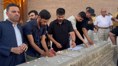 فيديو: أربيل توقد الشموع أمام بوابة القلعة على أرواح ضحايا الكوت