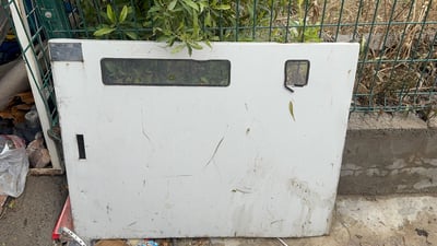 با و باران دەرگای بۆردێکی كارەبای لە گەڕەکێکی هەولێر خستەخوارەوە