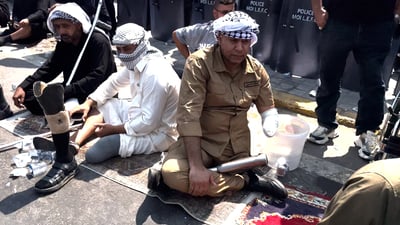 لليوم الخامس.. جرحى الحشد يرفضون التراجع عن الاعتصام أمام هيئة التقاعد ببغداد