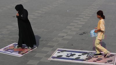 Iraqi armed factions threaten to target US forces if Iran attacked