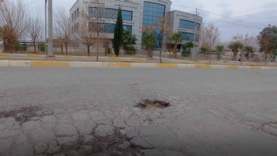 دانیشتوانی کۆیە داوای چاککردنی شەقامی ‘دوو سایدی هەنارە’ دەکەن