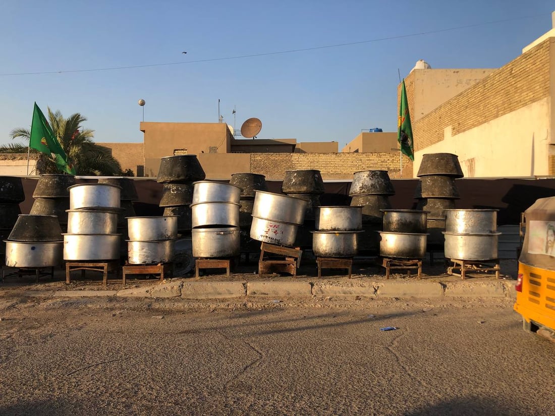 صور من كواليس وليمة عاشوراء في شارع فلسطين: 450 قدر “تمن وقيمة” هذا العام