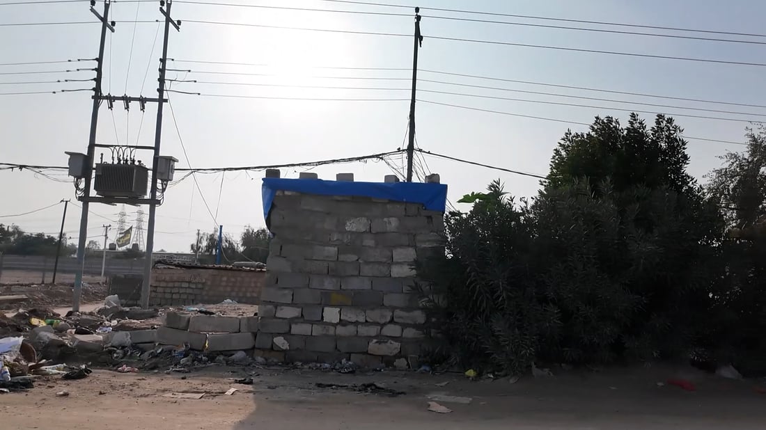 Najaf investors say squatters exploit licensing delays to demand compensation