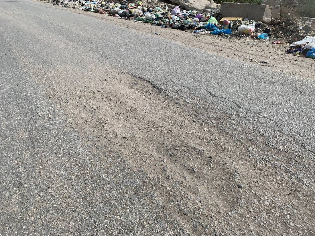 صور من هور رجب: شارع خط النفط مبلّط.. لكنه ضيق ومتخسف بسبب الشاحنات