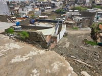 باران و لافاو دیوارێکی راگری بەسەر دوو ماڵدا رووخاندوو...