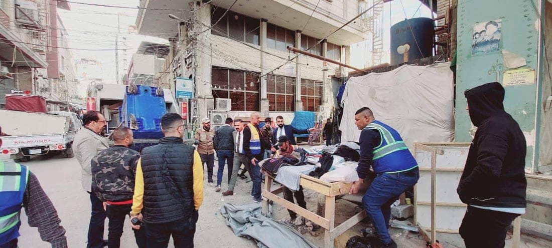 صور من النجف: الشفل الأصفر يقتلع البسطيات في شوارع الرسول والقديمة ومحيط الإمام