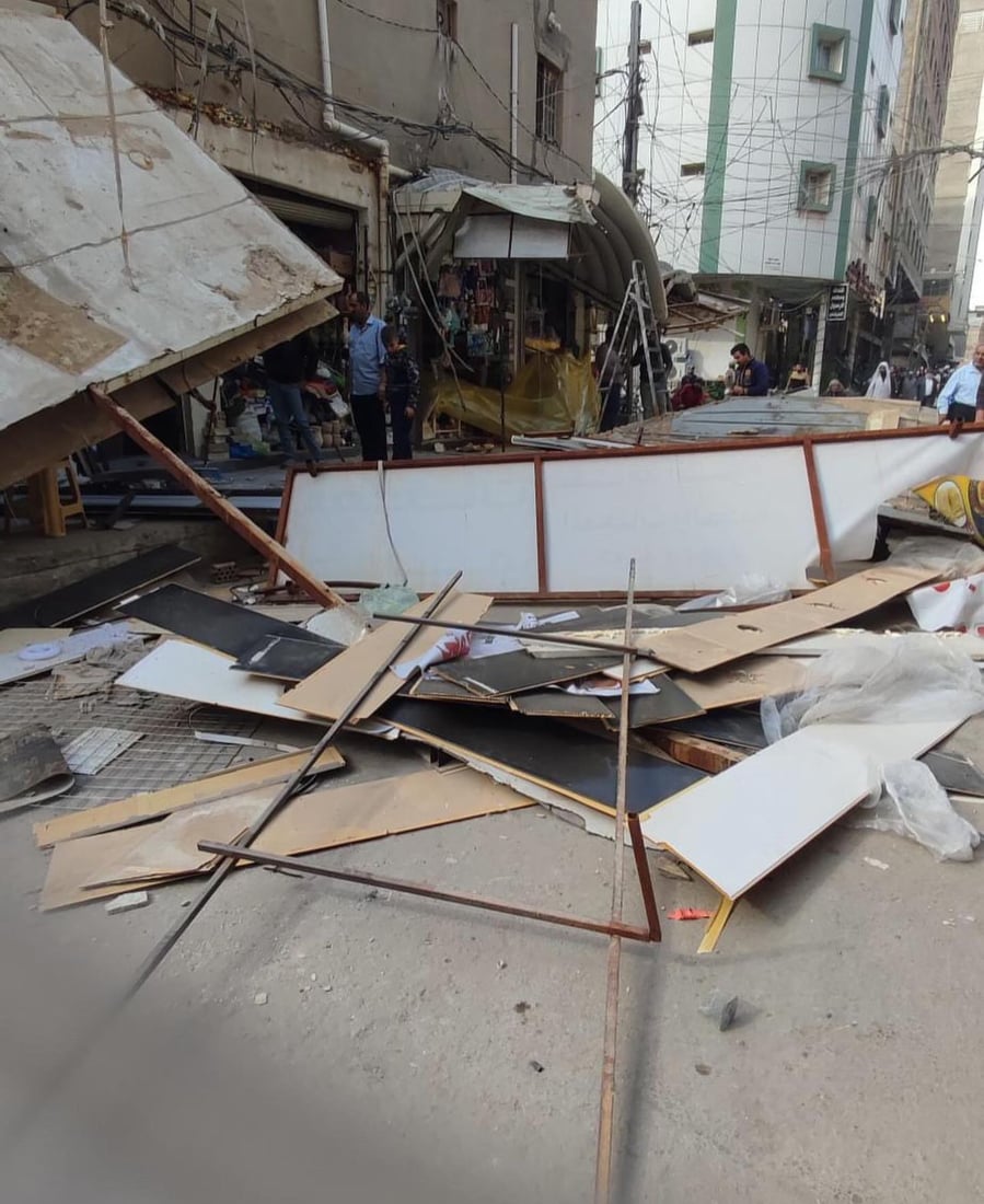 صور من النجف: الشفل الأصفر يقتلع البسطيات في شوارع الرسول والقديمة ومحيط الإمام