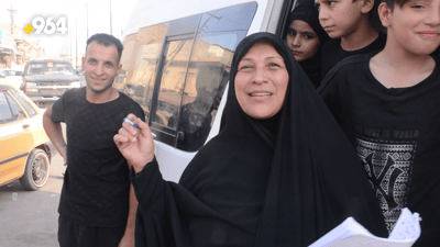 السيدة “أم حسن” لا تمل زبائنها ورحلاتها إلى كربلاء والنجف رخيصة ومريحة (فيديو)