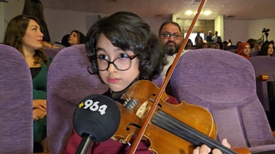 منداڵە بلیمەتەکە میوزیک بۆ 964 دەژەنێت